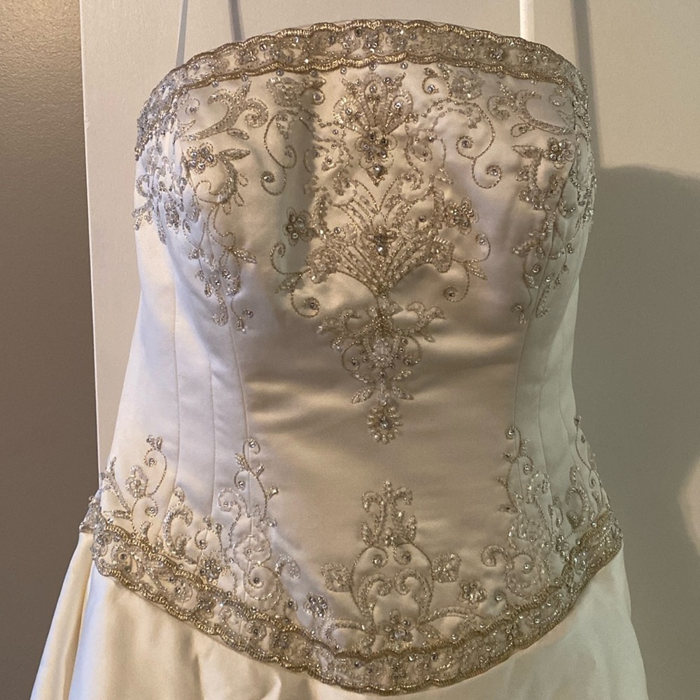 Ivory satin wedding gown